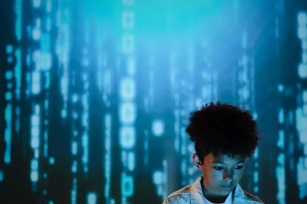 Teenagers typing code and building digital worlds